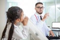 doctor holding a syringe needle with injection vaccination. girl Royalty Free Stock Photo