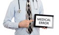 Doctor holding tablet - Medical error