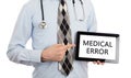 Doctor holding tablet - Medical error Royalty Free Stock Photo