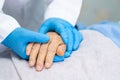 Doctor holding touching hands Asian senior or elderly old lady woman patient with love, care, helping, encourage and empathy Royalty Free Stock Photo