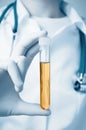 Doctor holding urine sample Royalty Free Stock Photo