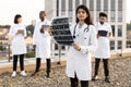 Doctor holding x-ray scan of patient during break outdoors hospital. Royalty Free Stock Photo