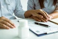 Doctor holds hands and leaves comforting counselors to patient Royalty Free Stock Photo