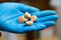 The doctor holds in his hand medicines, pills Royalty Free Stock Photo