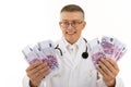 Doctor holds a lot of euros and is surprised Royalty Free Stock Photo