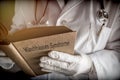 Doctor holds in a Munchausen syndrome book in a hospital.