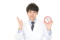 Doctor holds non smoking sign Royalty Free Stock Photo