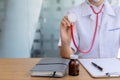 Doctor holds a stethoscope, stethoscope a medical device that every doctor needs. in listening to the lungs, heart sounds and Royalty Free Stock Photo