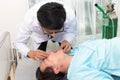 Doctor in the hospital talking and demonstrating first aid Royalty Free Stock Photo