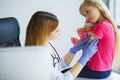 Doctor injecting vaccination in arm little child girl,healthy an Royalty Free Stock Photo