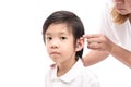 Doctor Inserting Hearing Aid Royalty Free Stock Photo