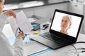 doctor with laptop having video call at hospital Royalty Free Stock Photo