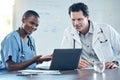 Doctor, laptop and meeting on a video conference at the hospital for medical discussion at the workplace. Healthcare Royalty Free Stock Photo
