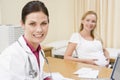 Doctor with laptop and pregnant woman Royalty Free Stock Photo