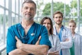 Doctor leading a medical team at the hospital.