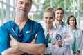 Doctor leading a medical team at the hospital.