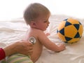 Doctor listening patient kid with stethoscope Royalty Free Stock Photo