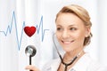 Doctor listening to heart beat Royalty Free Stock Photo