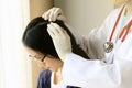 Doctor looking at patient`s hair and scalp, Dermatologist exam scalp disorder. Royalty Free Stock Photo