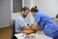 Doctor makes a patient an injection into a vein Royalty Free Stock Photo