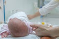 Doctor making drainage for newborn baby