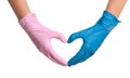 Doctor making heart with hands in different medical gloves Royalty Free Stock Photo
