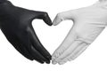 Doctor making heart shape with hands in different medical gloves Royalty Free Stock Photo