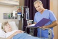 Doctor Making Notes About His Patient Royalty Free Stock Photo