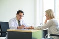 Doctor male using stethoscope to woman patient for listening heart rate on sickbed at hospital,Selective focus hand Royalty Free Stock Photo