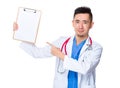 Doctor man finger point to clipboard Royalty Free Stock Photo