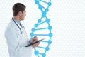 Doctor man holding a folder with DNA strand Royalty Free Stock Photo