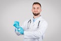 Doctor man holding syringe ready for vaccination Royalty Free Stock Photo