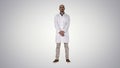 Doctor man is a little bit nervous and scared standing on gradie Royalty Free Stock Photo