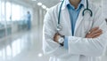 Doctor Man With Stethoscope on white blurred Hospital
