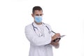 Doctor Man Writing in Clipboard Wearing Medical Mask Isolated. Doctor Working with Clipboard. Commecial, Shopping