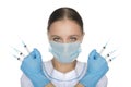 Doctor in mask and gloves holding syringe