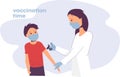 A doctor in a mask vaccinates a child, a boy from covid-19, the boy will be healthy, vaccination time Royalty Free Stock Photo