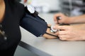 Doctor measures the blood pressure of a patient