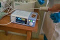 Doctor measures heart rate and oxygen saturation level in patient blood. Medical equipment. Human hand with attached