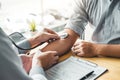 Doctor Measuring arterial blood pressure with man patient on arm Health care in hospital Royalty Free Stock Photo