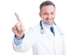 Doctor or medic pointing finger on invisible transparent screen