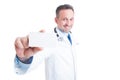 Doctor or medic showing blank business card