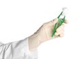 Doctor in medical glove holding disposable forceps Royalty Free Stock Photo