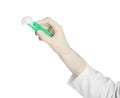 Doctor in medical glove holding disposable forceps with cotton ball Royalty Free Stock Photo