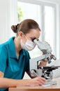 Doctor with microscope Royalty Free Stock Photo