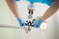 Doctor with a microscope in a dental clinic