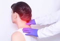 Doctor neurologist examines the patient`s sore neck on a pinched nerve and protrusion of the spine, medical Royalty Free Stock Photo