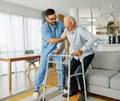 nurse doctor senior care caregiver help walker assistence retirement home nursing elderly man hospital clinic home Royalty Free Stock Photo