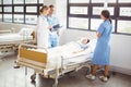 Doctor and a nurse examine a patient Royalty Free Stock Photo