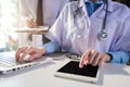 Doctor and nurse examining patient`s medical records and medical team working. Royalty Free Stock Photo